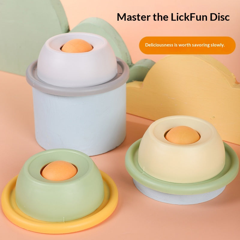 Slow Snack Lick Bowl anti-tip slow feeder in gray, yellow and green with treat ball center